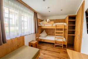 Postel nebo postele na pokoji v ubytování Hotel Garni Krumbach
