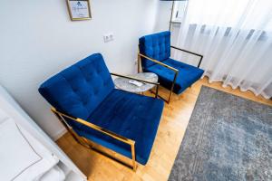 Posezení v ubytování City Apartments FN L7 KLIMATISIERT-mit Küche