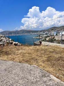 a view of a body of water with a city at Roel House in Sarandë