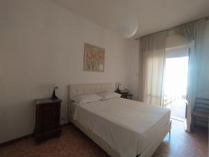 A bed or beds in a room at Brezza marina