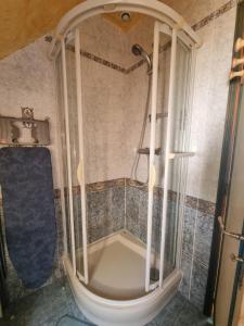 Koupelna v ubytování L'Oasis Studio + 15 fotografií