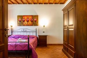 Posteľ alebo postele v izbe v ubytovaní Casa Vacanza Il Carpignone 3