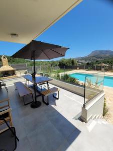 Bazén v ubytovaní Horizon Villa Almyrida alebo v jeho blízkosti