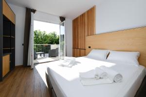 Hotel Arya by Mauro客房内的一张或多张床位