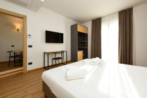 Hotel Arya by Mauro客房内的一张或多张床位