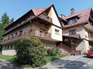 a large house with balconies on the side of it at DW Agat in Karpacz