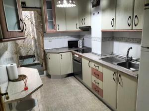 Kuchyňa alebo kuchynka v ubytovaní Apartamento Fabricio