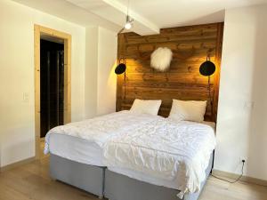 Ένα ή περισσότερα κρεβάτια σε δωμάτιο στο Superbe duplex central avec accès Spa, terrasse et parking - FR-1-623-288