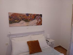 Postel nebo postele na pokoji v ubytování kirkis apartment