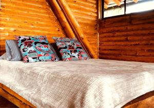 Postel nebo postele na pokoji v ubytování Skyline Ecoliving Santa Elena