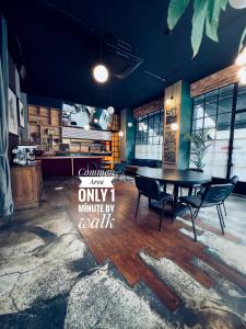 a restaurant with a table and chairs in a room at Nomad Hostel Karaköy in Istanbul +23 photos