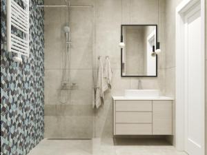 a bathroom with a sink and a shower at Stacja Baltic Twins in Sztutowo