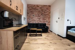 Kuchnia lub aneks kuchenny w obiekcie Dream Apartments - Gdańska 72