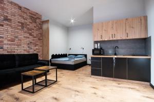 Kuchnia lub aneks kuchenny w obiekcie Dream Apartments - Gdańska 72