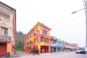 a colorful building on the side of a street at Spring Inn Hotel in Sungai Petani