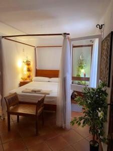 Posteľ alebo postele v izbe v ubytovaní Roc Beach Villa