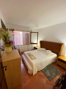 Posteľ alebo postele v izbe v ubytovaní Roc Beach Villa