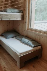 מיטה או מיטות בחדר ב-das Oberörtl - Kötschach-Mauthen