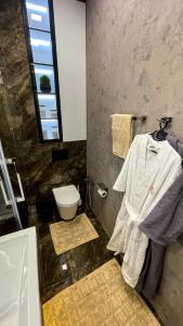 Een badkamer bij Апартаменты в ЖК Шоколад