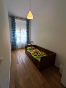 a bedroom with a bed in a room at In viaggio con Pippo - Ampio appartamento con AC nei pressi di Piazza Bovio e del Rivellino in Piombino