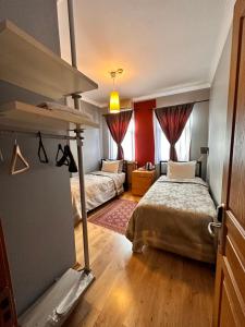 A bed or beds in a room at Ahmet Efendi Evi