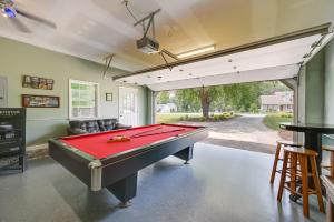 a billiard room with a pool table in it at 1-Acre Family Home with Pool about 11 Mi to Greensboro in Monticello