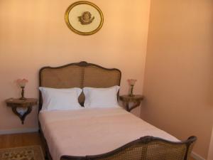 Uma cama ou camas num quarto em Quinta do Canto