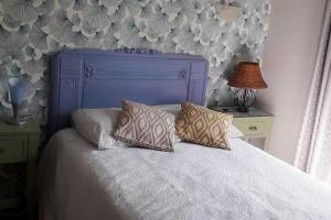 Ліжко або ліжка в номері Maison bord de mer
