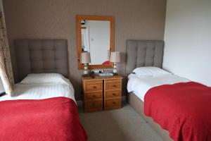 Letto o letti in una camera di The Olde Forge B & B
