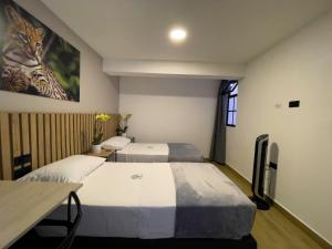 Postel nebo postele na pokoji v ubytování Vita Hotel Boutique