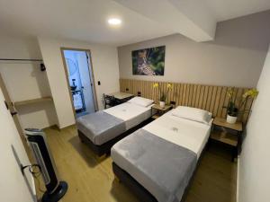 Postel nebo postele na pokoji v ubytování Vita Hotel Boutique
