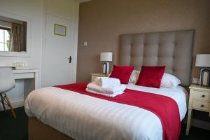 Letto o letti in una camera di The Olde Forge B & B