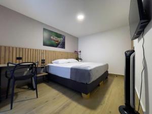 Postel nebo postele na pokoji v ubytování Vita Hotel Boutique