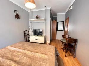 A bed or beds in a room at Ahmet Efendi Evi