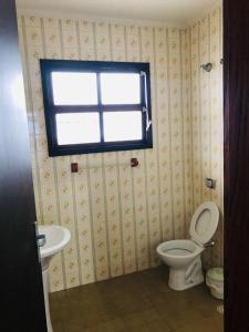 Ванная комната в Casa na Enseada- Guaruja