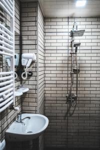 Koupelna v ubytování Fiten house