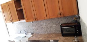 Kuhinja oz. manjša kuhinja v nastanitvi Casa BLU - Vacanze a La Strea - Torre Squillace - Porto Cesareo