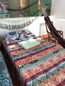 Tempat tidur dalam kamar di Casa Museo, Hostal Nina Nikoly Ramirez
