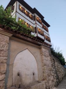 a building with lights on top of it at Fatma Hanım Konağı butik Otel in Safranbolu