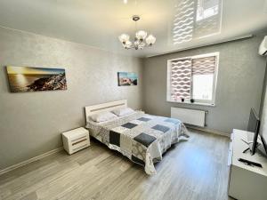 Posteľ alebo postele v izbe v ubytovaní Apartment in center premium