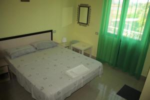 Rúm í herbergi á Hotel PRINC