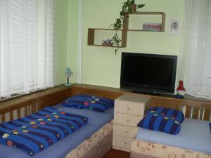 Postel nebo postele na pokoji v ubytování Penzion W