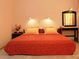 Ένα ή περισσότερα κρεβάτια σε δωμάτιο στο Calypso Hotel Apartments