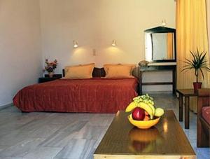 Ένα ή περισσότερα κρεβάτια σε δωμάτιο στο Calypso Hotel Apartments