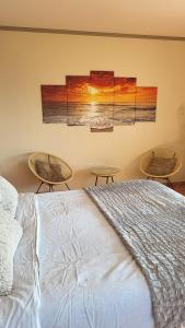 Postel nebo postele na pokoji v ubytování Villa Face Mer