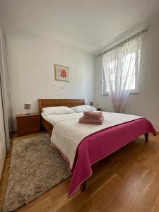 Postel nebo postele na pokoji v ubytování Apartment HAPPY HOME