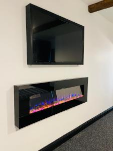 TV a/nebo společenská místnost v ubytování Wild Atlantic Way Rentals