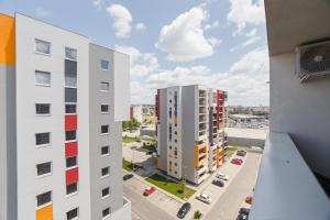 an aerial view of two tall buildings in a city at Charming Family Haven in Oradea