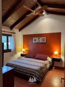 En eller flere senge i et værelse på Eden Park Cordoba