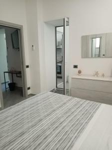 Letto o letti in una camera di Sa Benedica - Luxury House